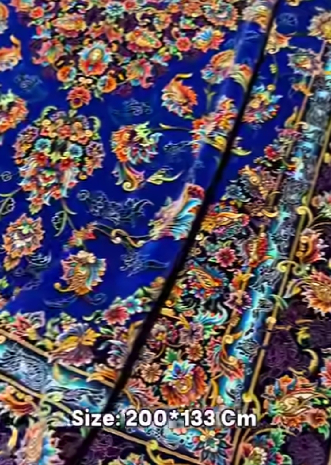 فرش دستباف تمام ابریشم ياقوتی