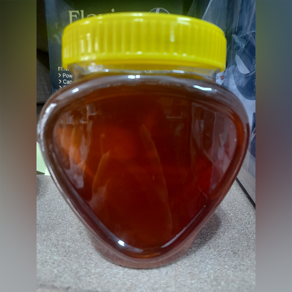 عسل طبیعی بزقوش موم و شیره