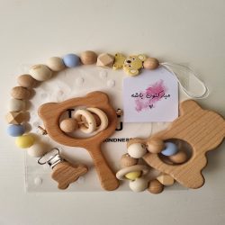 بند پستونک ، جغجغه و دنداگیر چوبی
